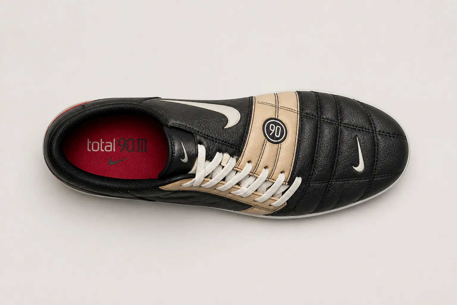 Flat lay of the Nike Total 90 sneaker showing the complete heritage color palette with rich earthy tones and premium material finish
