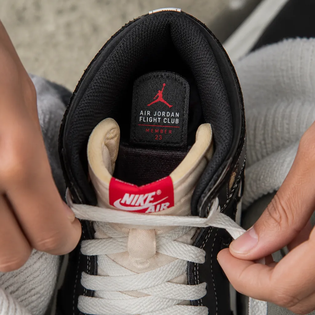 Ankle collar area displaying Flight Club membership program branding with premium leather tag