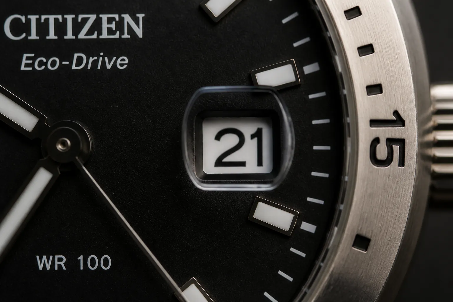 Detail view of date window on watch dial showing current date with magnifying cyclops lens for easy reading