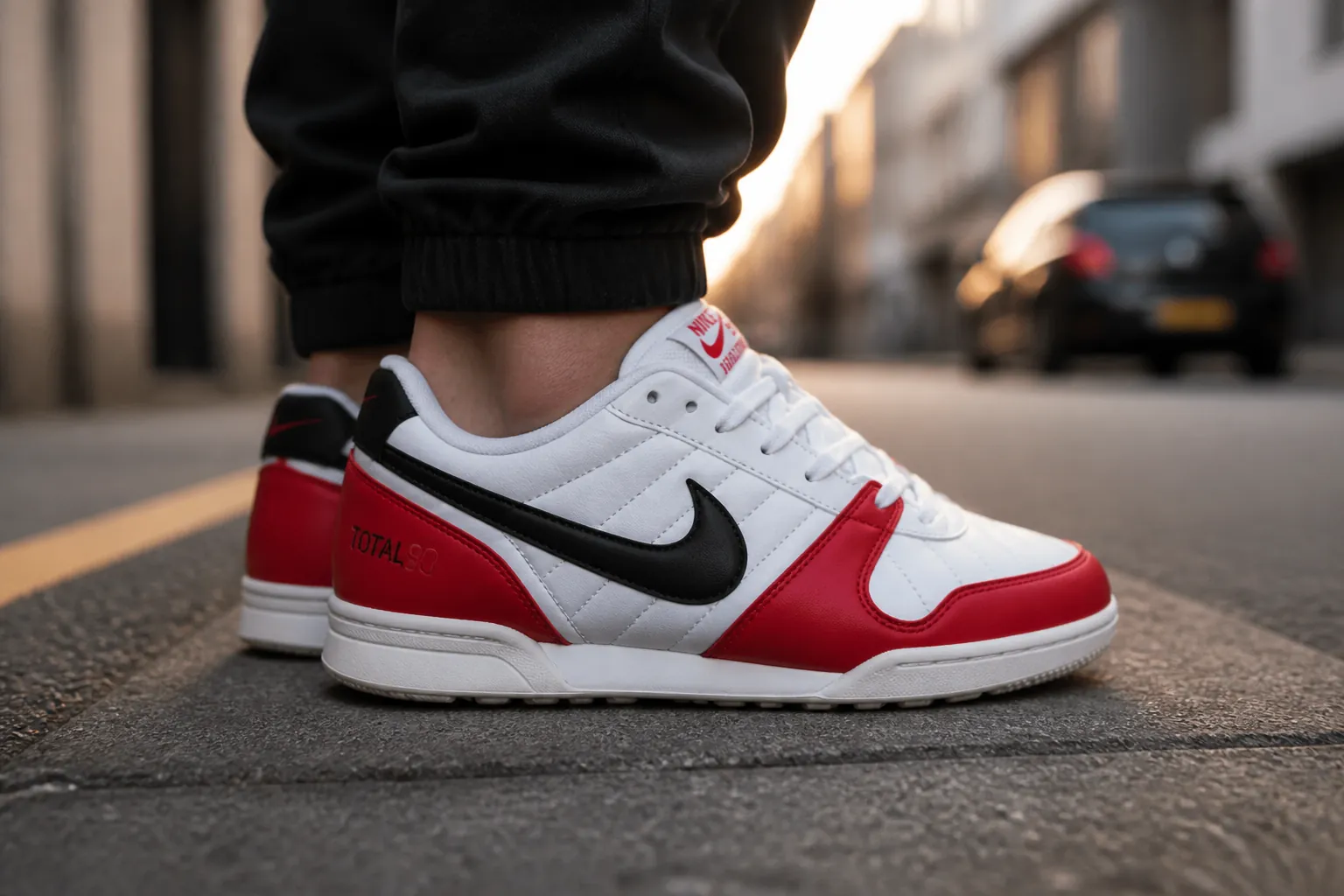 Nike Total 90 Premium heel detail showing the embroidered Total 90 logo and padded ankle collar construction