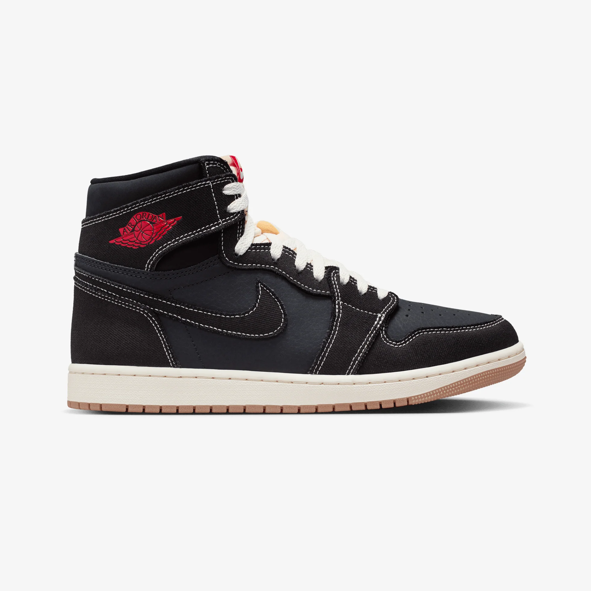 Nike Total 90 Premium men's shoes displayed from a dramatic 3/4 angle showing the iconic asymmetrical lacing and quilted upper
